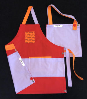 Apron is Red, Accents are Lilac Purple and Light Orange
