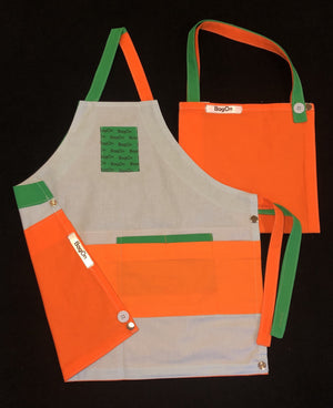 Apron is Light Blue, Accents are Orange and Green