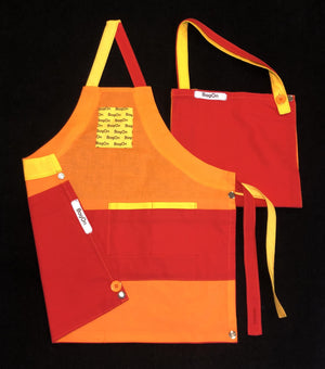 Apron is Light Orange, Accents are Red and Yellow