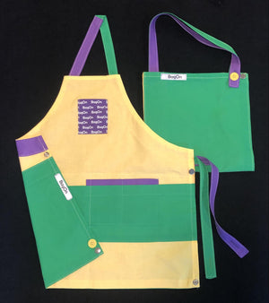 Apron is Light Yellow, Accents are Green and Purple