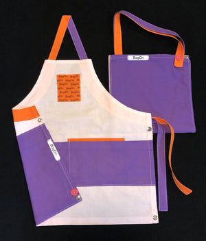 Apron is Pink, Accents are Purple and Orange